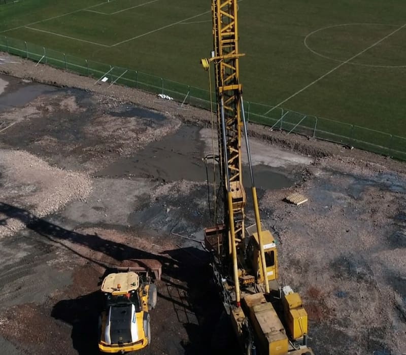 Large yellow crane on site at McAuliffe’s brownfield remediation programme in Wolverhampton.