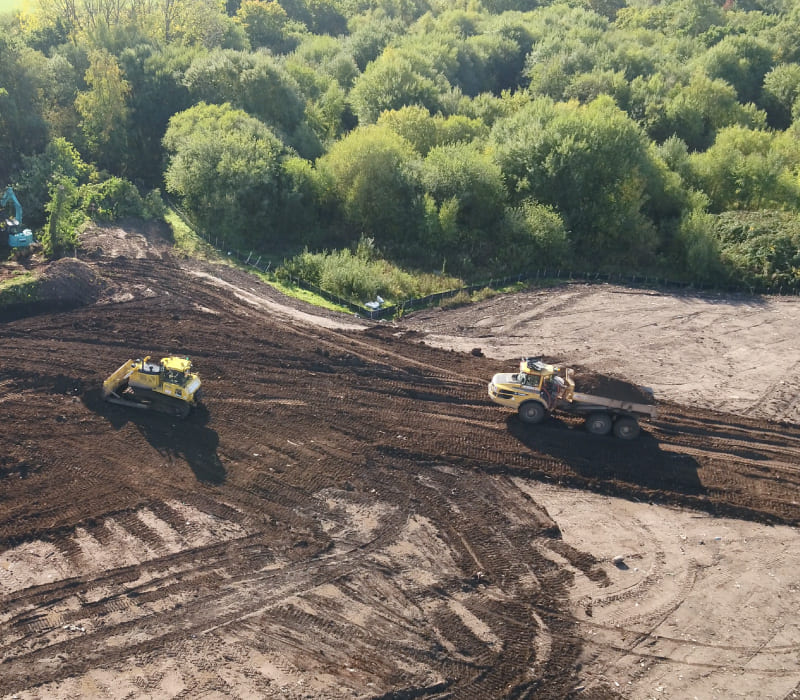 Yellow remediation equipment in use by McAuliffe to safely reuse 29,439m2 of material.